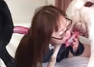Two hard animal cocks sucked by an Asian model